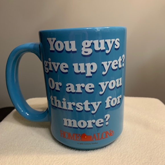 Home Alone mug with an image of Kevin made of gingerbread o… - Picture 1 of 4